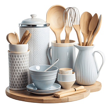 Kitchen utensils, bowls, and a canister arranged on a wooden tray