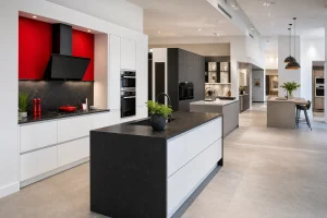 Modern kitchen showroom displays with fitted cabinets, worktops and open walkways