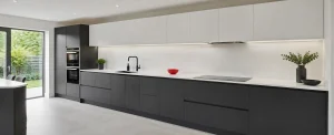 Modern fitted kitchen with contrasting cabinet finishes and a clean white worktop